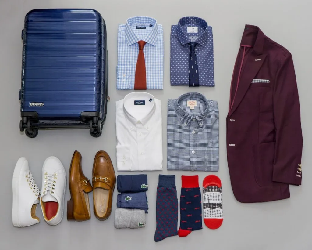packed minimalist travel outfit flatlay