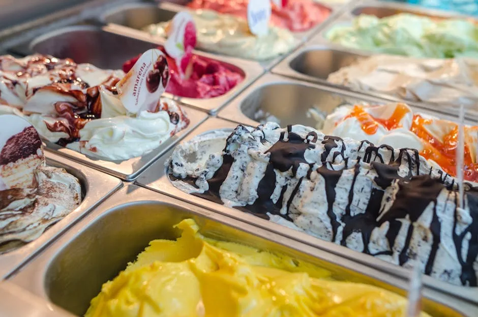 Colorful gelato tubs with chocolate drizzle at a San Gimignano gelateria