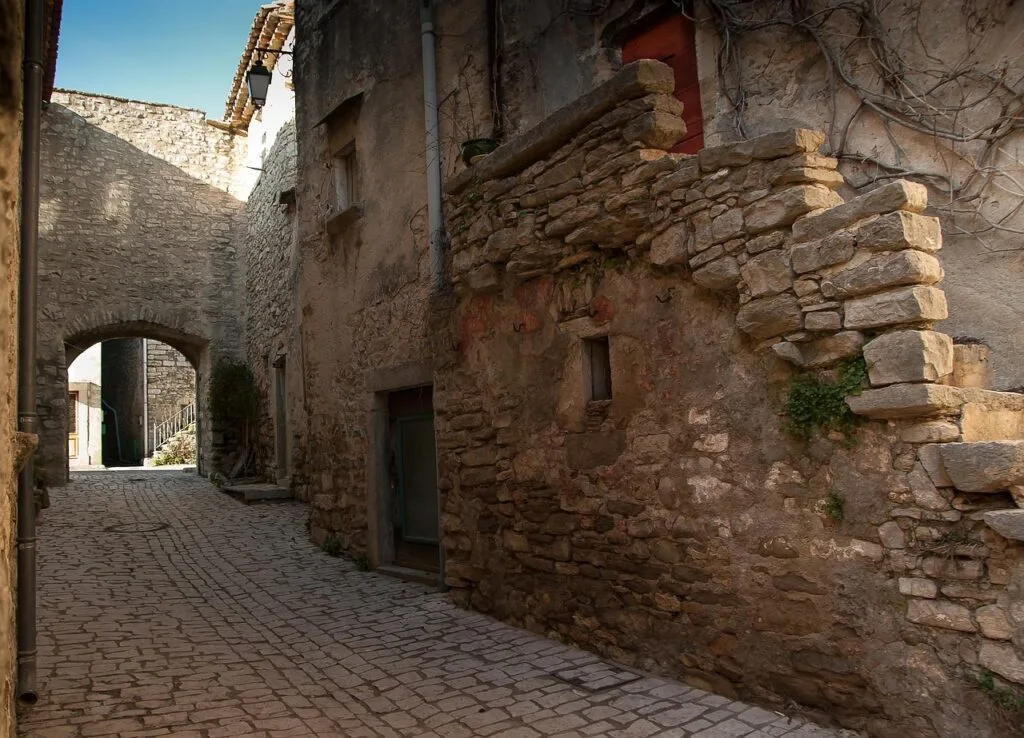 Stone alleyway in a rustic Tuscan village near Lucca