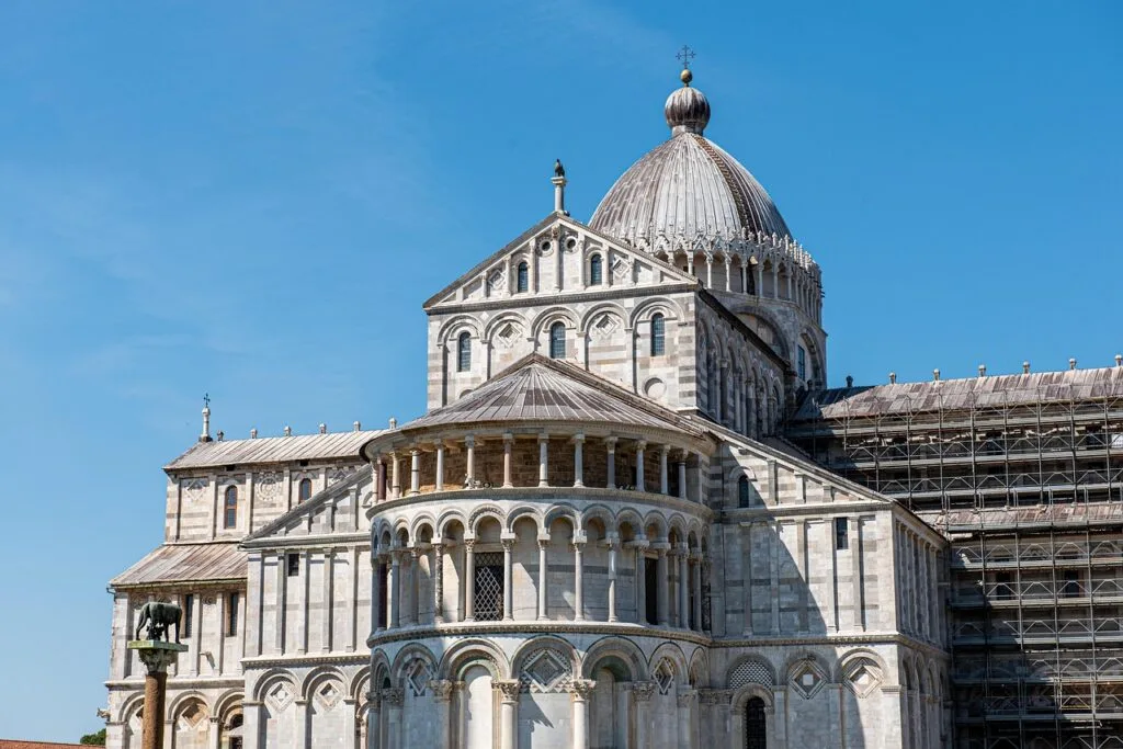 Dome and rounded apse of Lucca Cathedral bathing in sunlight