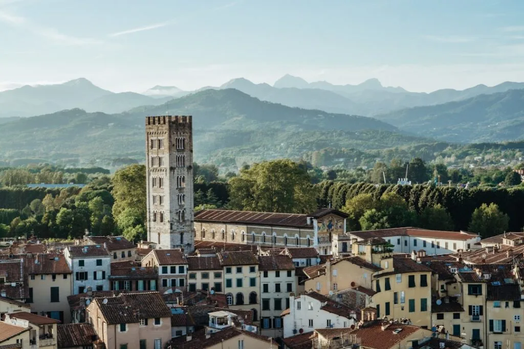 Lucca skyline with medieval tower and distant mountain range
